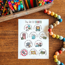 Load image into Gallery viewer, Bill of Rights with colorful illustrations on a wooden surface.
