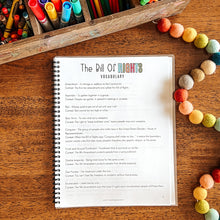 Load image into Gallery viewer, Notebook with 'Bill of Rights' vocabulary on a wooden surface with colorful markers and pens.
