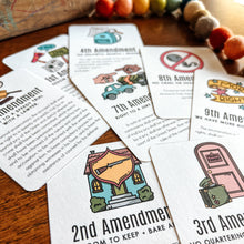 Load image into Gallery viewer, Educational cards about American amendments on a wooden surface with colorful beads.