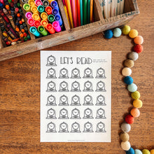 Load image into Gallery viewer, Colorful stationery items including crayons, markers, and pencils on a wooden surface with a 'Let's Read' worksheet.