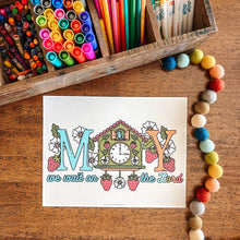 Load image into Gallery viewer, Coloring page with a cuckoo clock design on a wooden surface with art supplies.
