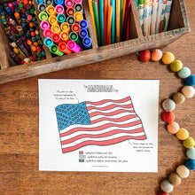 Load image into Gallery viewer, Colorful markers, pens, and a coloring sheet of the American flag on a wooden surface.