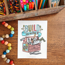 Load image into Gallery viewer, Colorful stationery items including markers, crayons, and a toolbox illustration on a wooden surface.