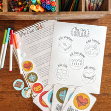 Load image into Gallery viewer, Colorful markers, pencils, and coloring sheets of the Five Solas on a wooden surface
