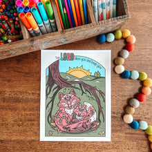 Load image into Gallery viewer, Colorful art print of two foxes under a tree, placed on a wooden surface with art supplies.
