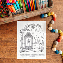 Load image into Gallery viewer, Coloring page with lantern design on a wooden surface with coloring supplies.
