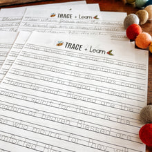 Load image into Gallery viewer, Beatitudes tracing pages surrounded by colorful pom-poms on a wooden surface.
