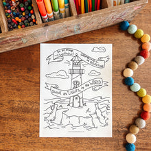 Load image into Gallery viewer, Coloring sheet with a lighthouse design on a wooden surface with colored pencils and pom-poms.

